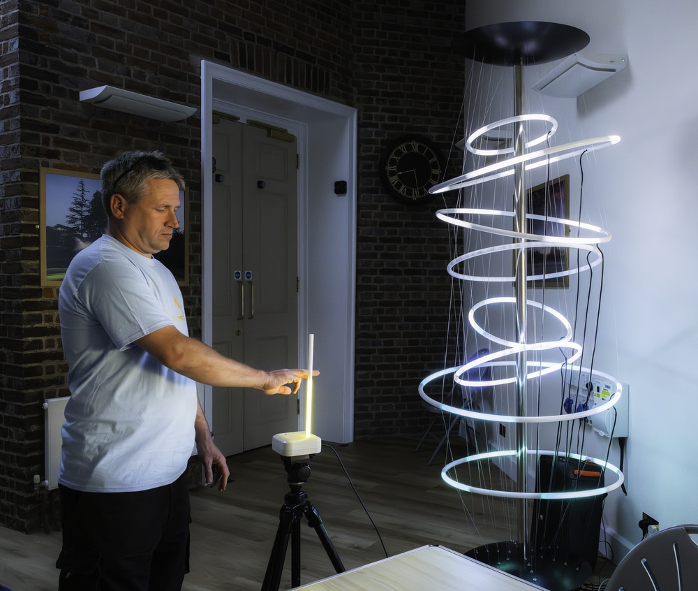 Chris Womble with Interactive sound and light sculpture “Endless"