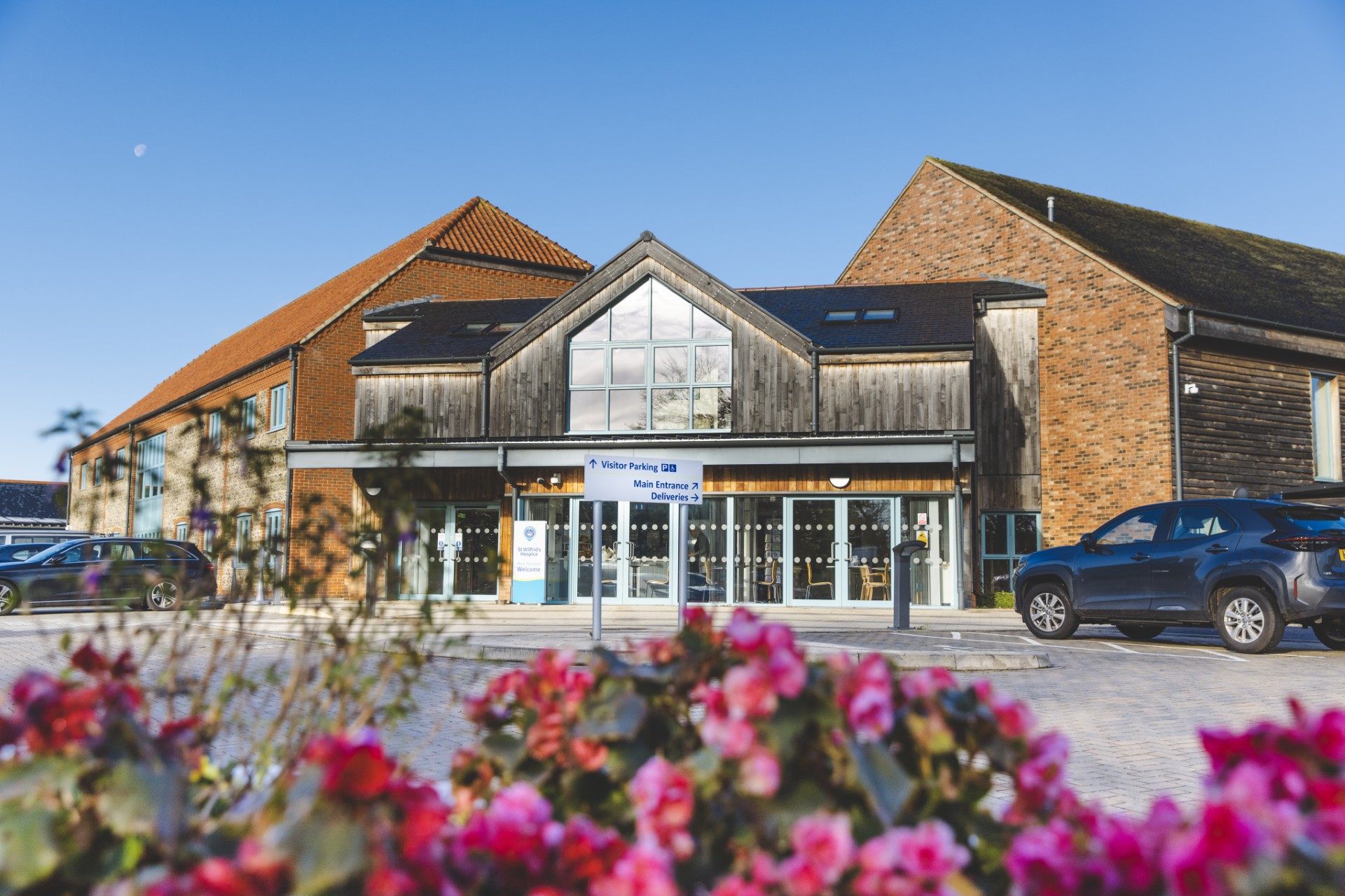 St Wilfrid's Hospice Exterior with flowers.